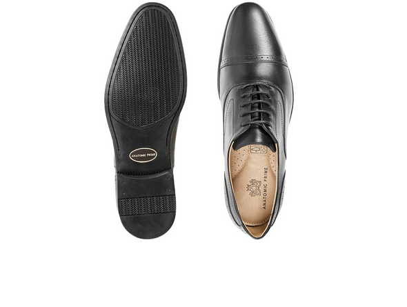 Anatomic & Co Fata - pair of laced Black leather formal shoes showing sole and insole against a white background. 