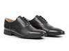 Anatomic & Co Fata - pair of laced Black leather formal shoes upper view against a white background. 