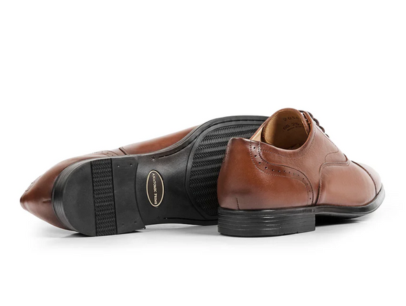 Anatomic & Co Fata - pair of laced Tan leather formal shoes with black sole visible against a white background