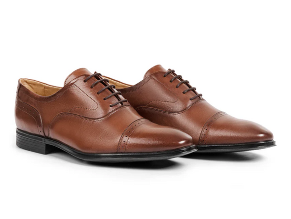 Anatomic & Co Fata - pair of laced Tan leather formal shoe against a white background