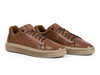 Anatomic & Co Madeiro - pair of Cedar brown leather sneakers with beige sole on white background. 