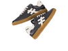 Another Trend A032-5816 black sneakers with white accents and rubber soles on white background