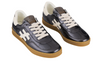 Another Trend A032-5816 black sneakers with white accents and rubber soles on white background