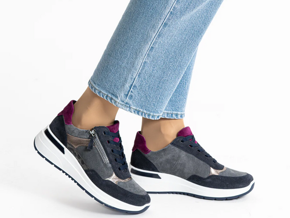 Ara 12-57702-22 Garda - Grey Blue sneaker with purple accents, laced with side zip worn by lady wearing light blue jeans