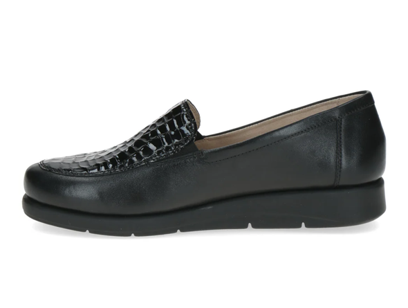 Caprice 24750-41 - Black loafer shoe with a subtle wedge heel and a textured vamp on a white background, inner view
