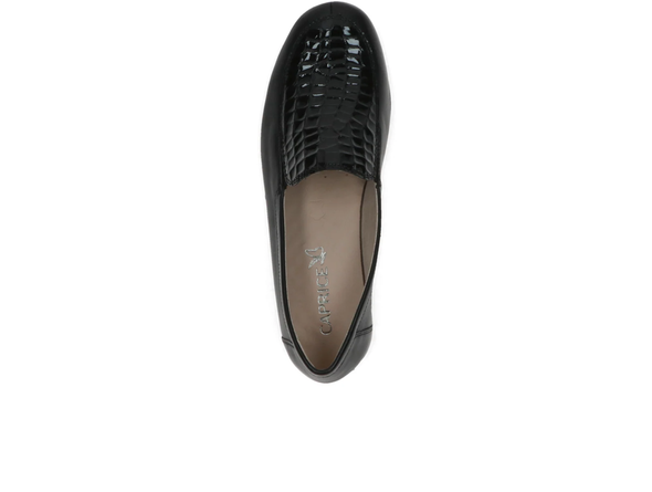 Caprice 24750-41 - Black loafer shoe with a subtle wedge heel and a textured vamp on a white background, top view