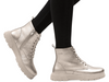 Caprice 9-26256- 45-959 - Gold metallic laced boot with a tonal sole on worn with black leggings on a white background