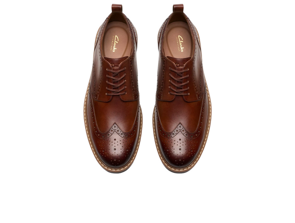 Clarks Aldwin Limit - pair of Mid Tan laced leather brogue shoes on a white background.