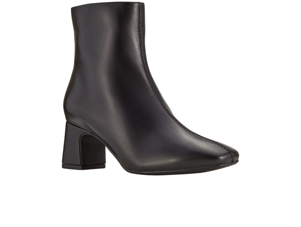 Clarks Fernie Zip - Black leather ankle boot with block heel on a white background upper view