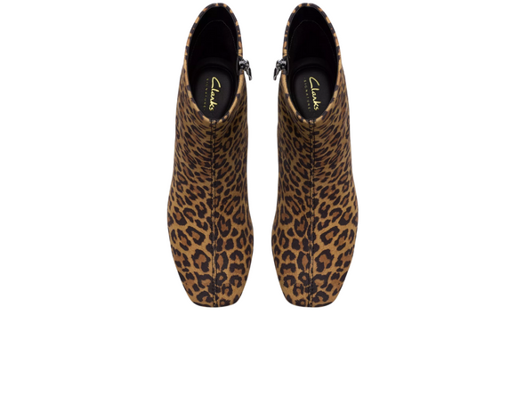 Clarks Fernie Zip - Leopard Suede ankle boot with block heel on a white background top view