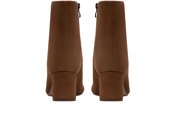 Clarks Fernie Zip - Walnut Suede ankle boot with a block heel on a white background back view