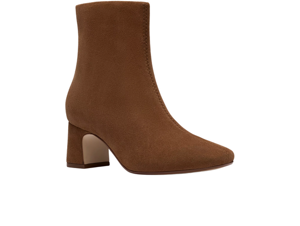 Clarks Fernie Zip - Walnut Suede ankle boot with a block heel on a white background upper view