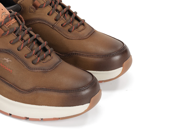 Fluchos Triton F2069 pair of laced Brown leather shoes with white soles on a white background