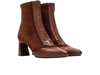 Pair of Hispanitas BHI254186 I25 Soho - Tan Brown ankle boots with a pointed toe and block heel and frontal zip on a white background. 