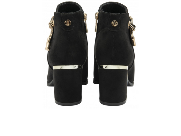 Lotus Tina ULB457 - Black ankle boot, suede effect with decorative know detail  around the ankle and a mirrored effect block heel o f6.5cm on white background back view