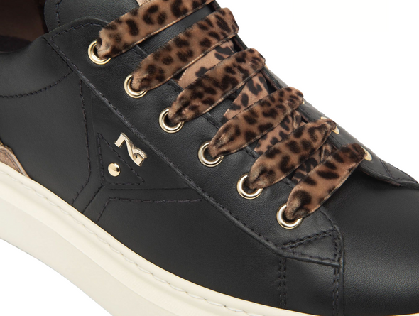 NeroGiardini I514160D-100 - Black sneakers with gold and glitter accents; leopard print laces and a white platform sole on a white background.