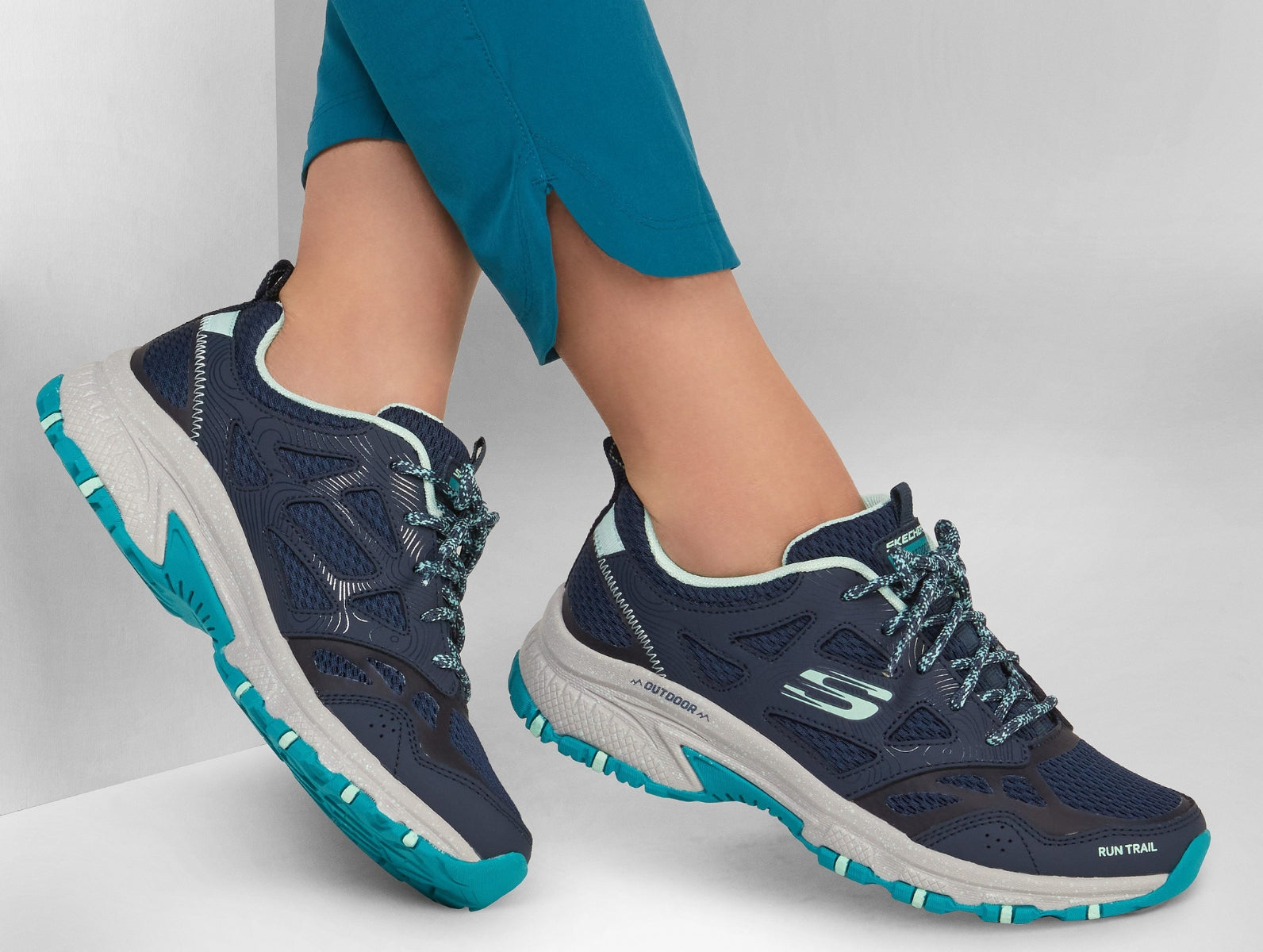 Turquoise skechers top