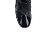 Softmode Clara 6474 - Navy patent ankle boot with outer and inner zip on a white background, close up of the toe from above.