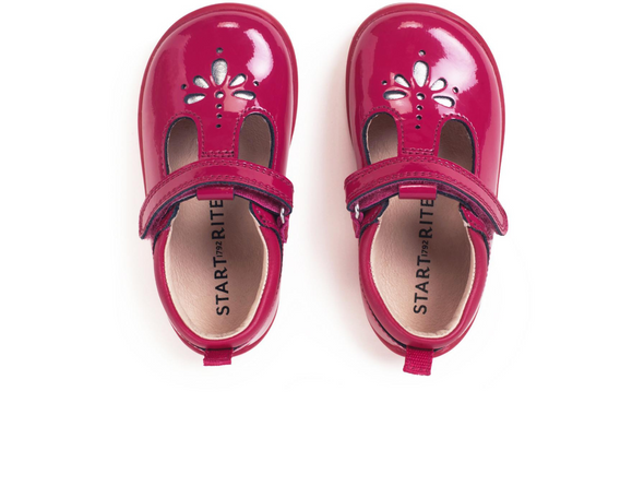 Startrite Puzzle 0779-18 - pair of Cherry Red t-bar shoes with Velcro strap and punched detail on white background