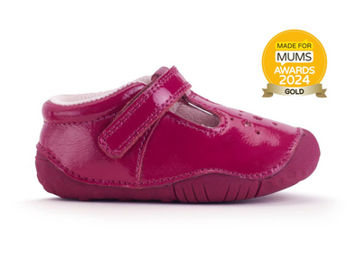 Startrite Tumble 0761-8 - Cherry Red baby shoe in red patent leather with a Velcro strap and star cut out detail on a white background outer view