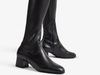 Unisa LAPES_F25_STT_STN - pair of Black knee high boots with a square toe, 5 cm block heel and full length inner zip on a white background. 